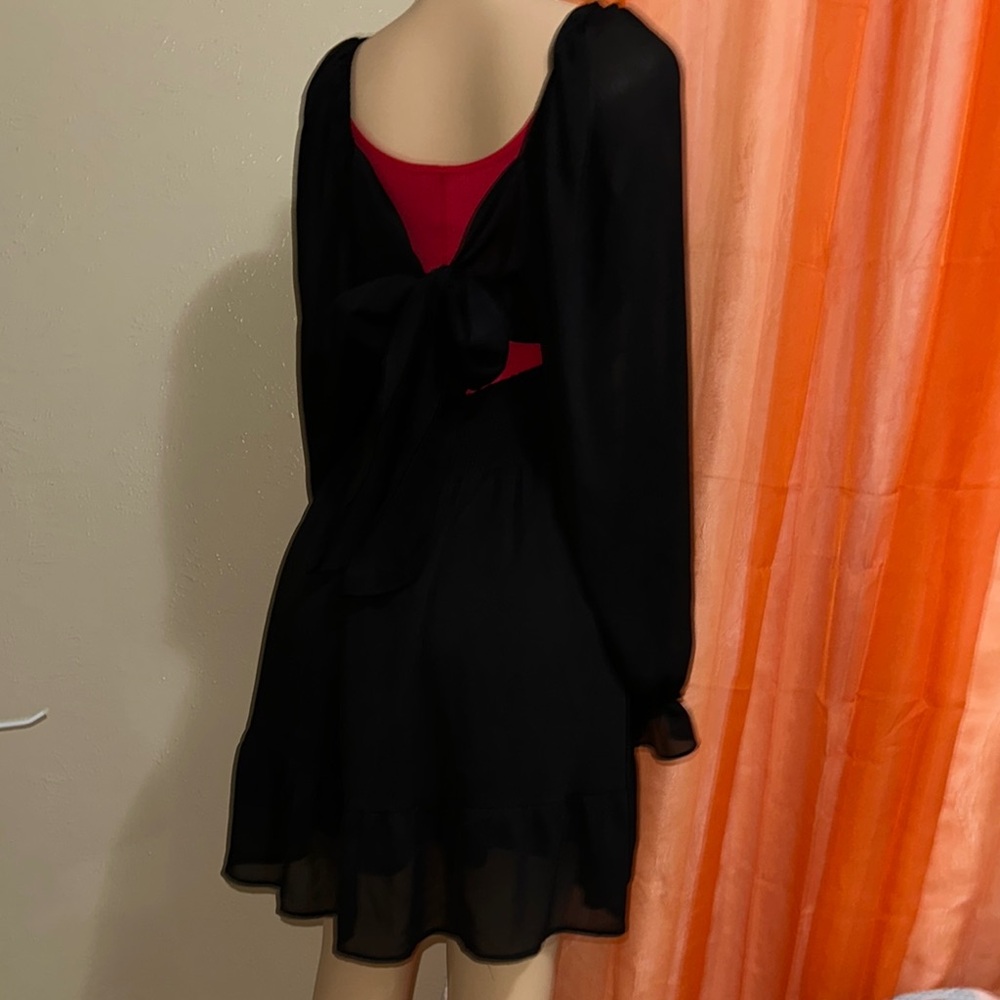 Elegant Black Dress with Red Accent